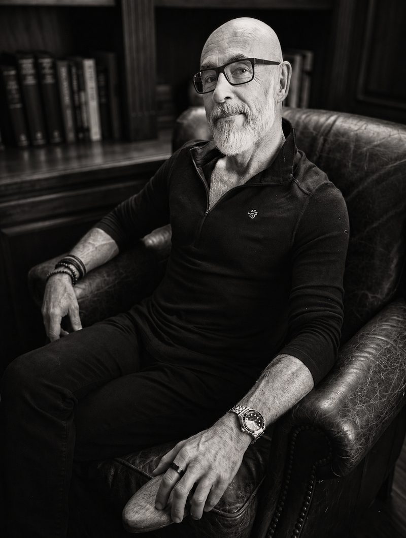 Vic Holtreman, photographed in a library setting.